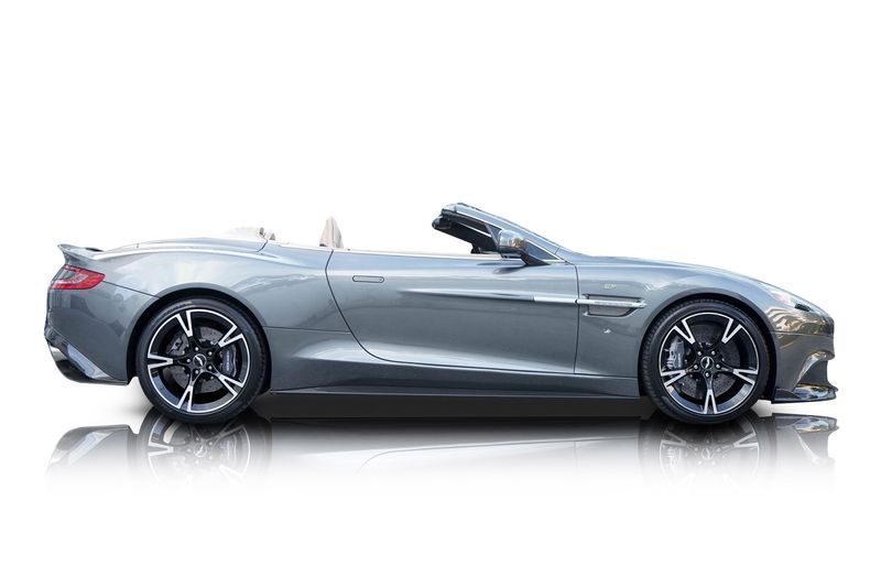 An incredible side shot photo of aAston Martin Vanquish that you should buy.
