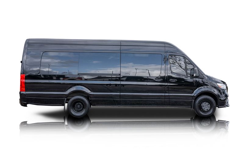 An incredible side shot photo of aMercedes-Benz Sprinter 3500 that you should buy.