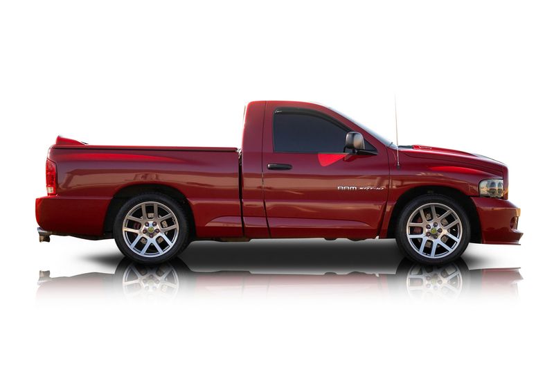 An incredible side shot photo of aDodge Ram 1500 that you should buy.