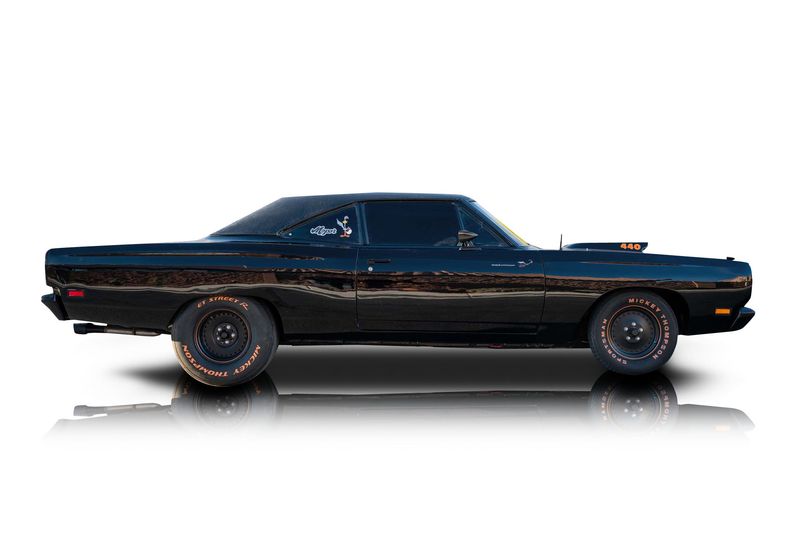 An incredible side shot photo of aPlymouth Road Runner that you should buy.