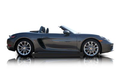 Passenger side photo of 2022 Porsche 718 Boxster