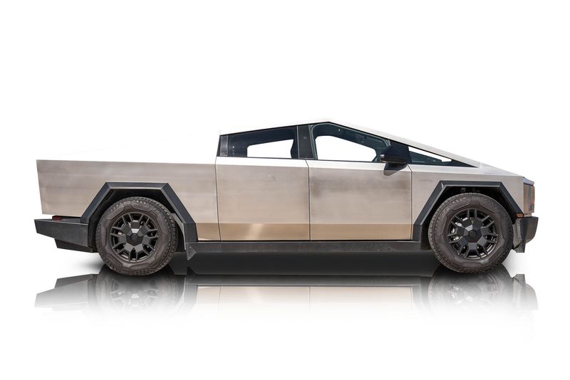 An incredible side shot photo of aTesla Cybertruck that you should buy.