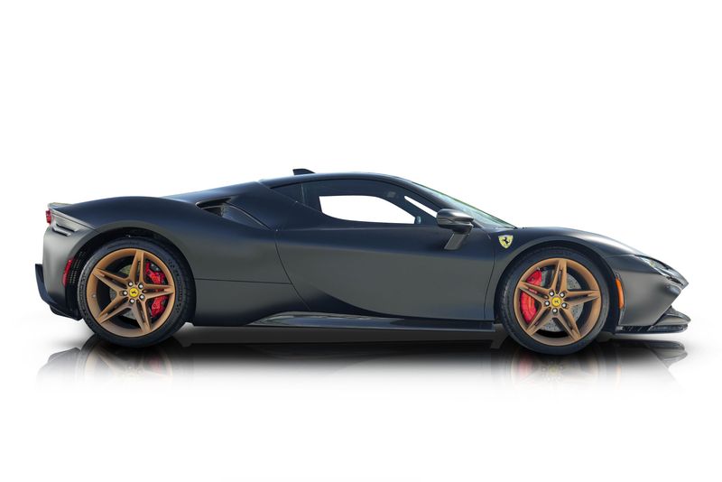 An incredible side shot photo of aFerrari SF90 that you should buy.