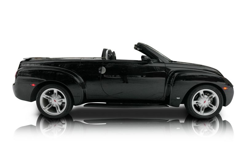 An incredible side shot photo of aChevrolet SSR that you should buy.
