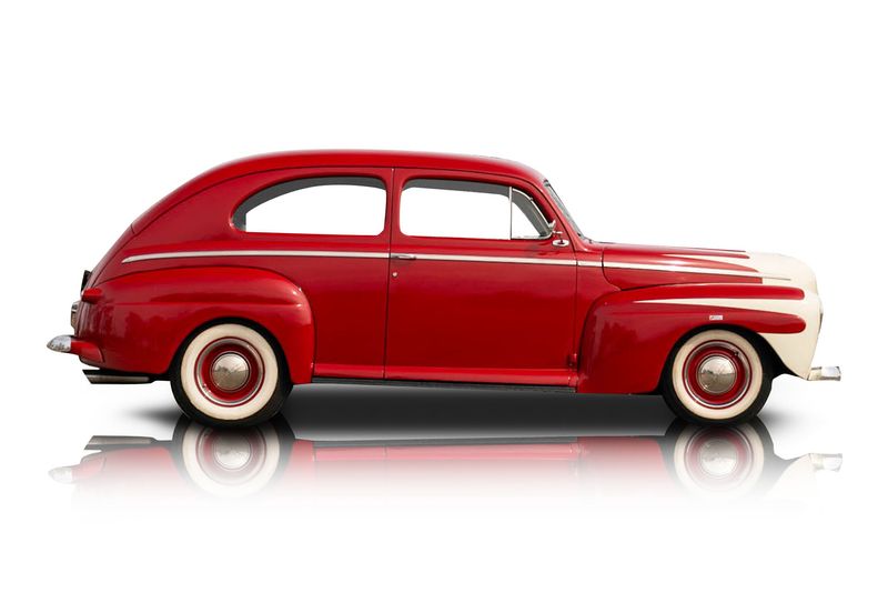 An incredible side shot photo of aFord Super Deluxe that you should buy.