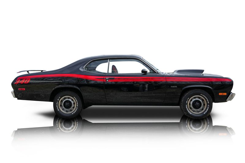 An incredible side shot photo of aPlymouth Duster that you should buy.