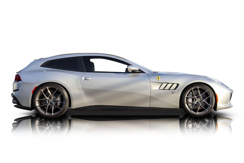 An incredible side shot photo of aFerrari GTC4Lusso that you should buy.