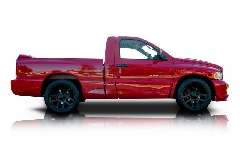 An incredible side shot photo of aDodge Ram 1500 that you should buy.