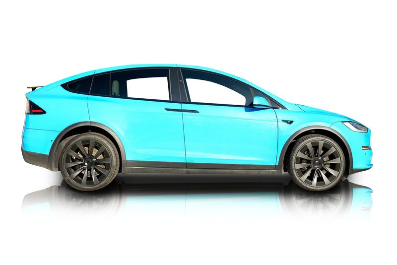 An incredible side shot photo of aTesla Model X that you should buy.