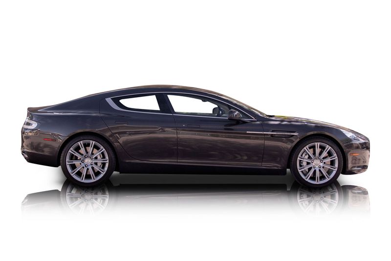 An incredible side shot photo of aAston Martin Rapide that you should buy.