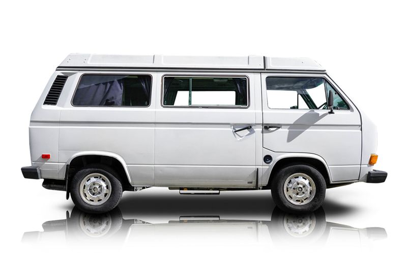 An incredible side shot photo of aVolkswagen Vanagon that you should buy.