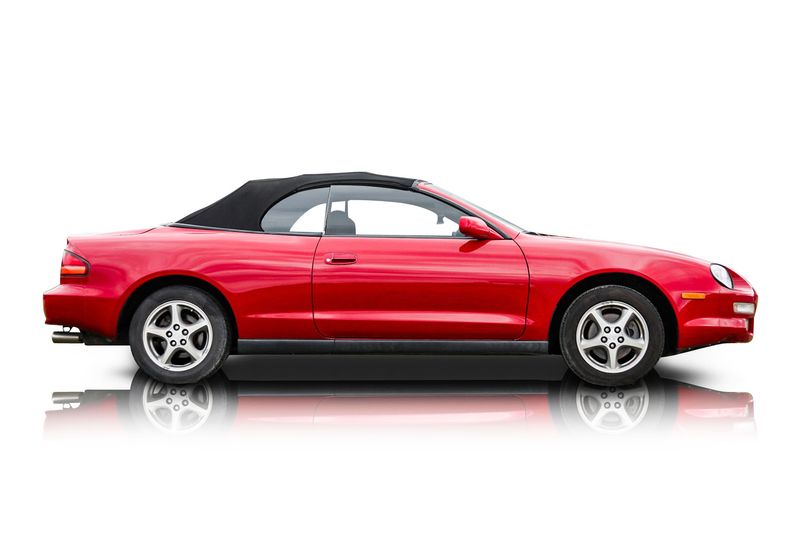 An incredible side shot photo of aToyota Celica that you should buy.