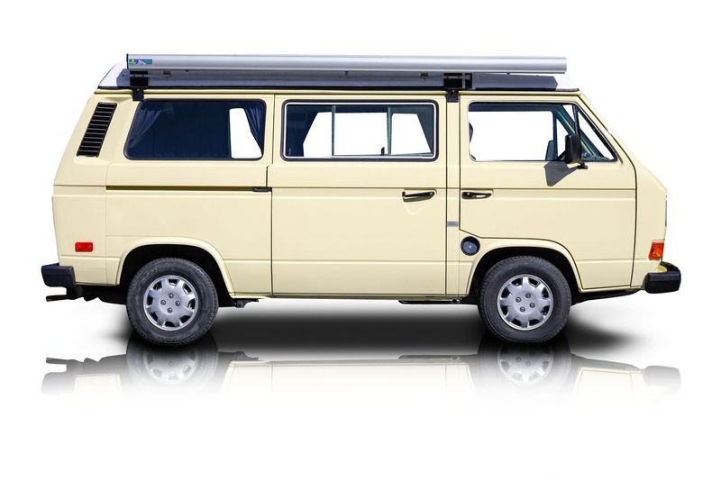 An incredible side shot photo of aVolkswagen Vanagon that you should buy.