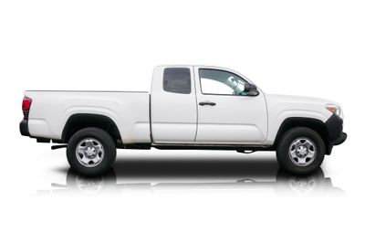 Passenger side photo of 2021 Toyota Tacoma