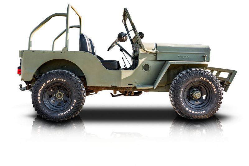 An incredible side shot photo of aJeep CJ3B that you should buy.