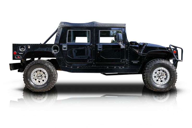 An incredible side shot photo of aAM General Hummer that you should buy.