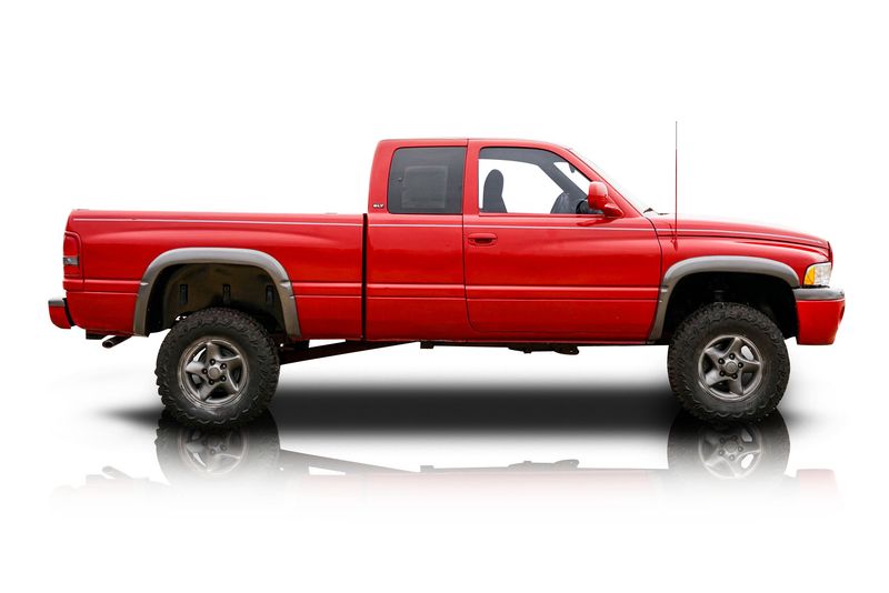 An incredible side shot photo of aDodge Ram 1500 that you should buy.