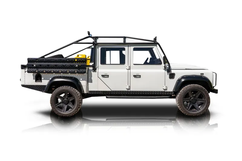 An incredible side shot photo of aLand Rover Defender 130 that you should buy.