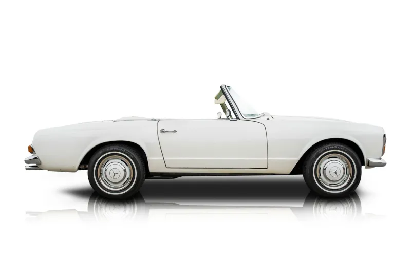 An incredible side shot photo of aMercedes-Benz 230SL that you should buy.
