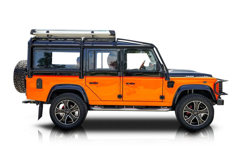 An incredible side shot photo of aLand Rover Defender 110 that you should buy.