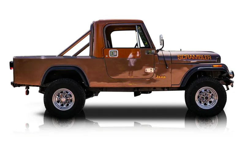 An incredible side shot photo of aJeep CJ-8 Scrambler that you should buy.
