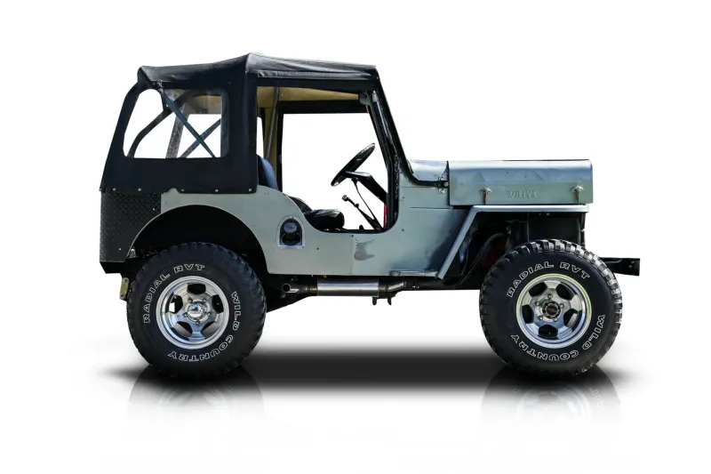 An incredible side shot photo of aWillys CJ-3B that you should buy.