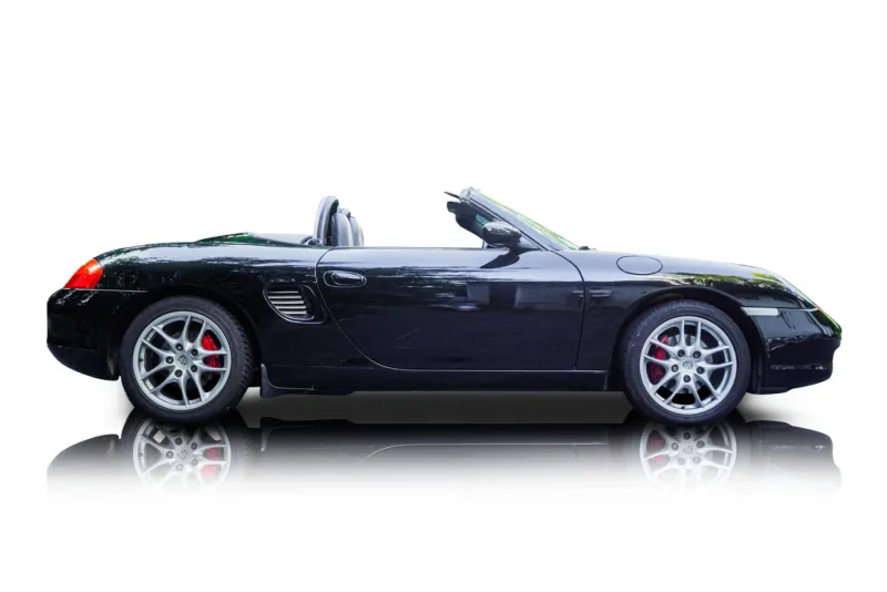 An incredible side shot photo of aPorsche Boxster that you should buy.