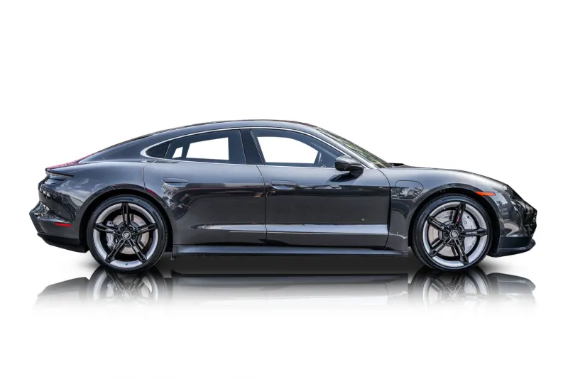 An incredible side shot photo of aPorsche Taycan that you should buy.