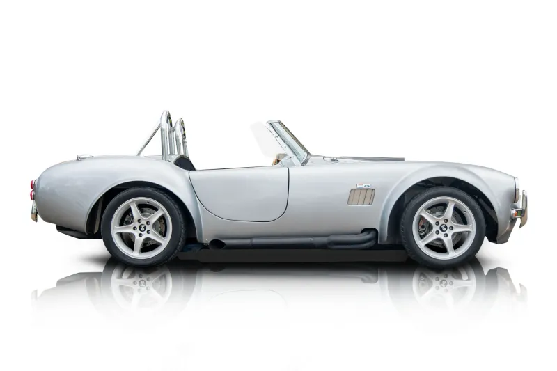 An incredible side shot photo of a car that you should buy.