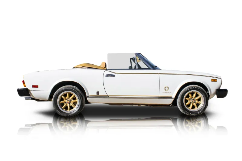 An incredible side shot photo of aFiat 124 Spider that you should buy.