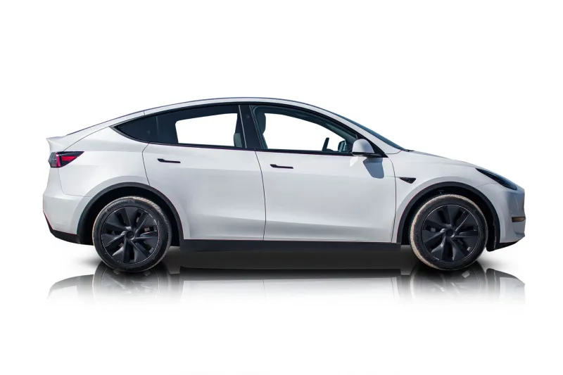 An incredible side shot photo of aTesla Model Y that you should buy.