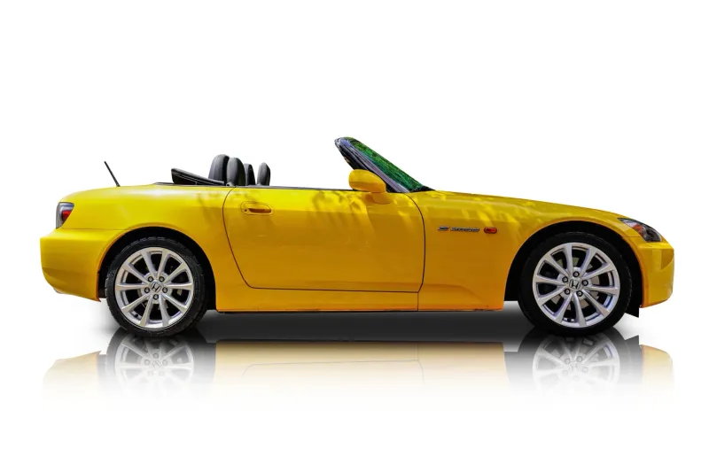 An incredible side shot photo of aHonda S2000 that you should buy.