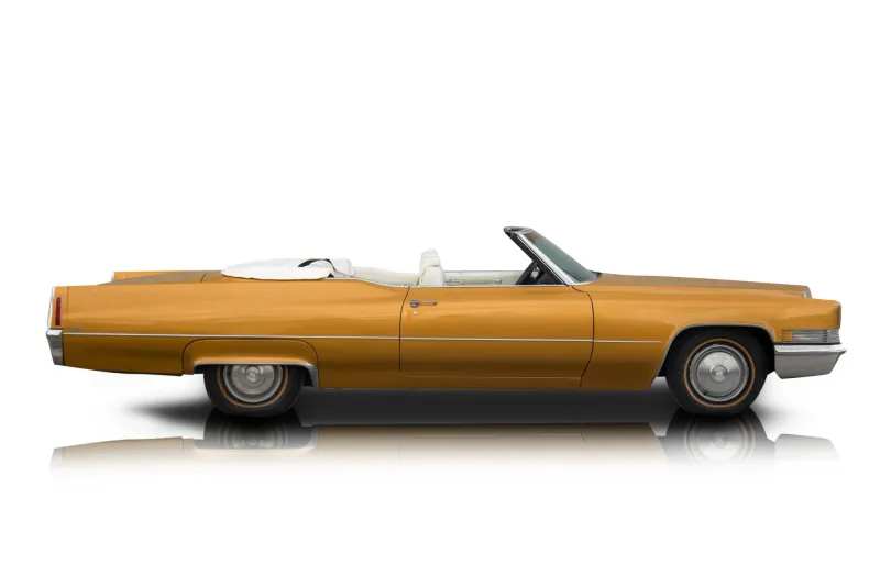 An incredible side shot photo of aCadillac DeVille that you should buy.