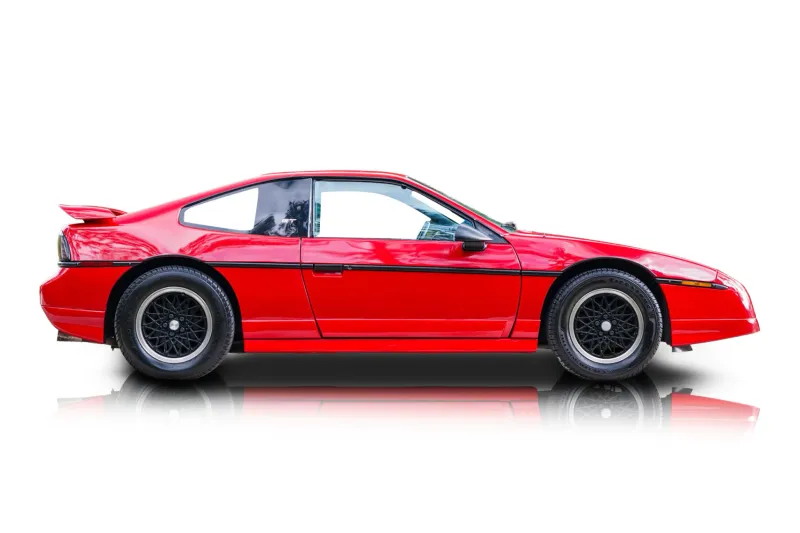 An incredible side shot photo of aPontiac Fiero that you should buy.