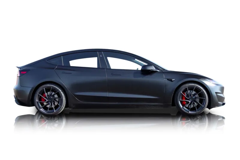 An incredible side shot photo of aTesla Model 3 that you should buy.