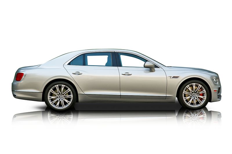An incredible side shot photo of aBentley Flying Spur that you should buy.