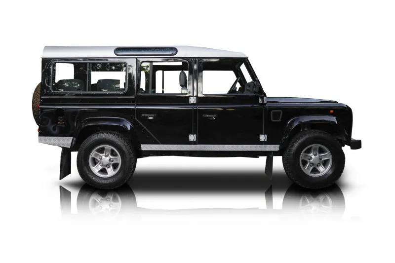 An incredible side shot photo of aLand Rover Defender 110 that you should buy.