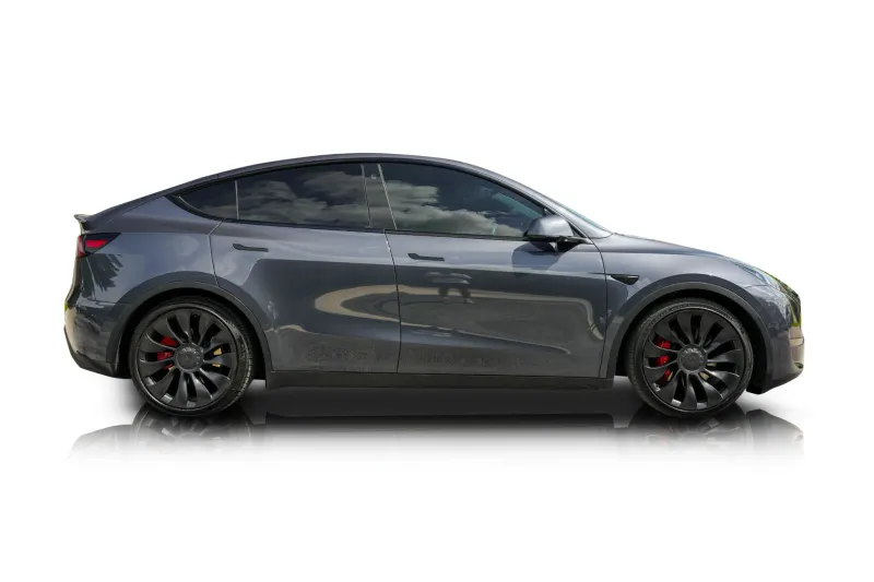 An incredible side shot photo of aTesla Model Y that you should buy.