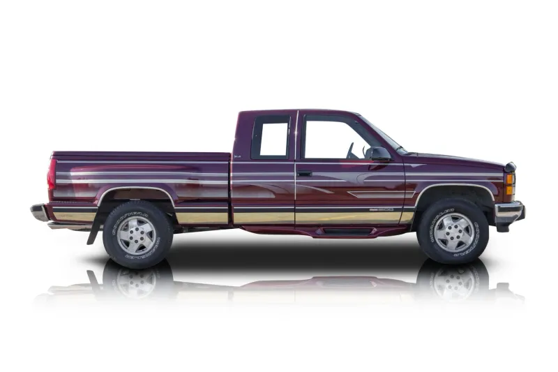 An incredible side shot photo of aGMC Sierra 1500 that you should buy.