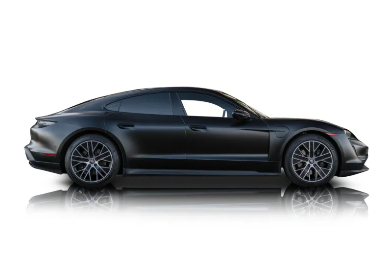 An incredible side shot photo of aPorsche Taycan that you should buy.