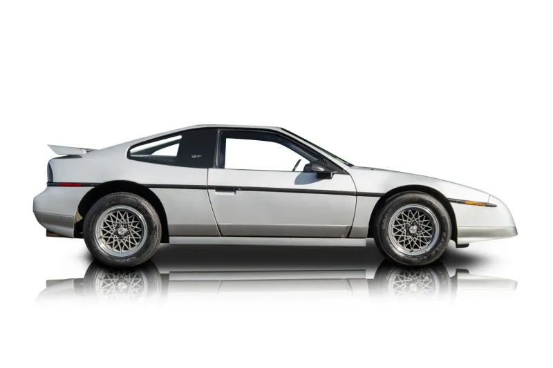 An incredible side shot photo of aPontiac Fiero that you should buy.