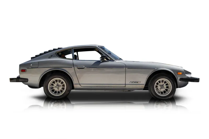 An incredible side shot photo of aDatsun 280Z that you should buy.