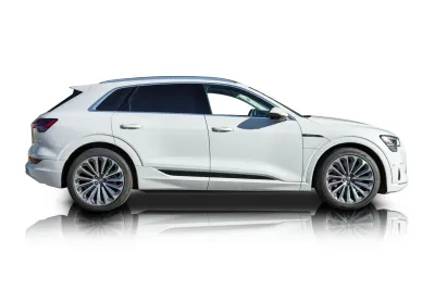 Passenger side photo of 2019 Audi e-Tron