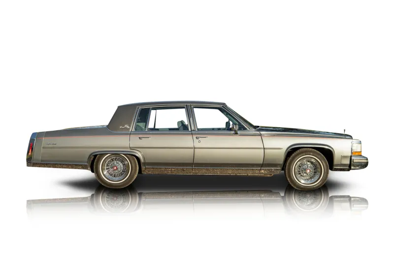 An incredible side shot photo of aCadillac Brougham that you should buy.