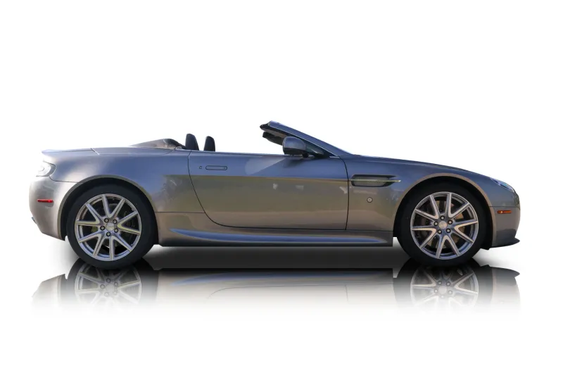 An incredible side shot photo of aAston Martin Vantage that you should buy.