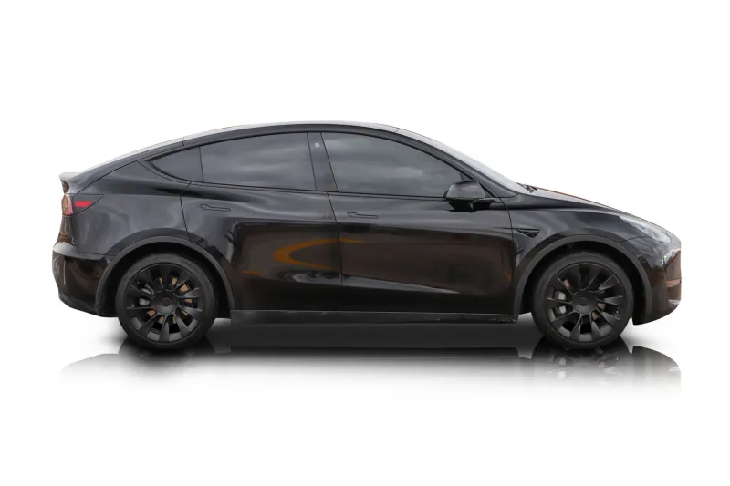 An incredible side shot photo of aTesla Model Y that you should buy.