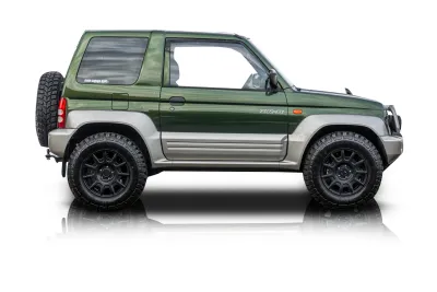 Passenger side photo of 1996 Mitsubishi Pajero Junior