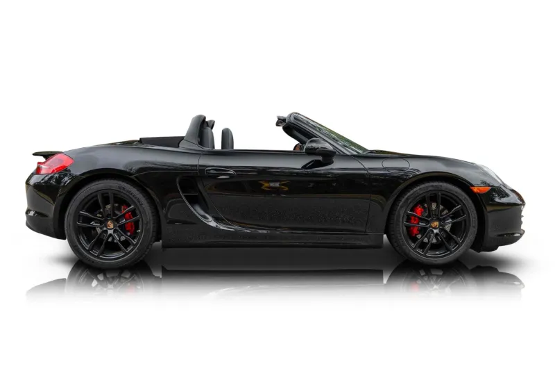 An incredible side shot photo of aPorsche Boxster that you should buy.
