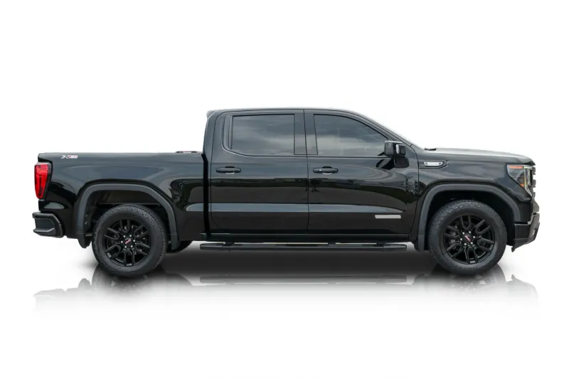 An incredible side shot photo of aGMC Sierra 1500 that you should buy.