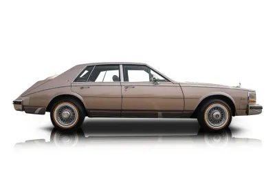 Passenger side photo of 1985 Cadillac Seville